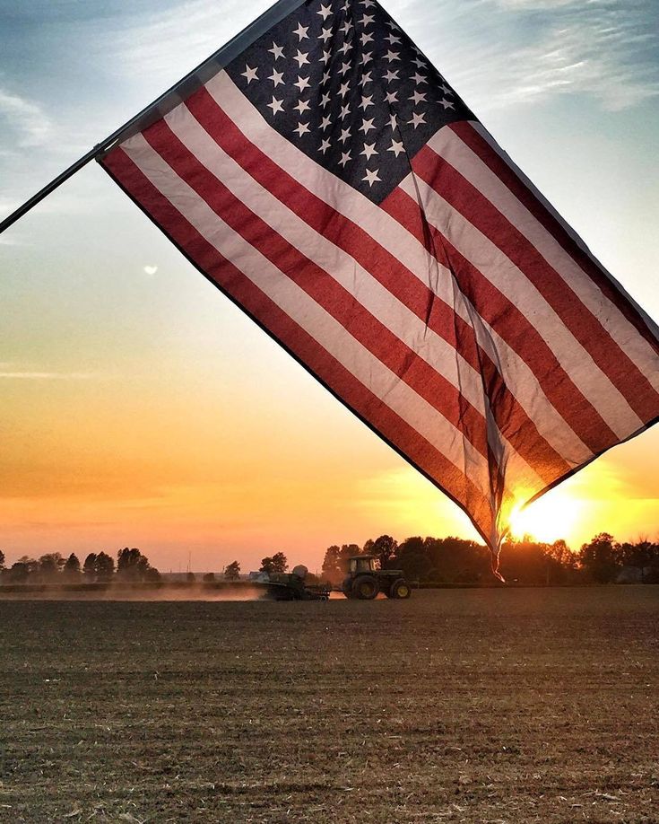 flag-with-tractor-in-background